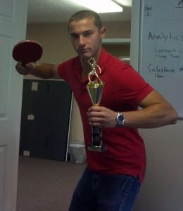 Jimmy Love with his Ping Pong champion trophy